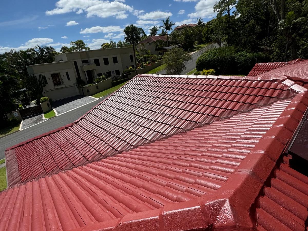 Close detail of the restored red ridge capping