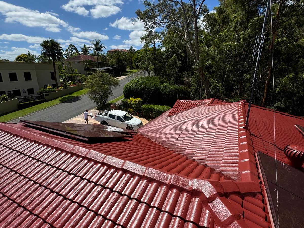 The red roof against the neighbouring homes